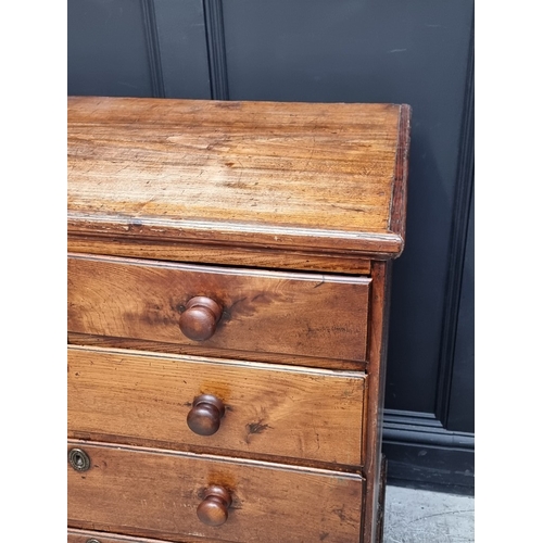 1036 - A George III elm and pine chest of drawers, 95.5cm wide.