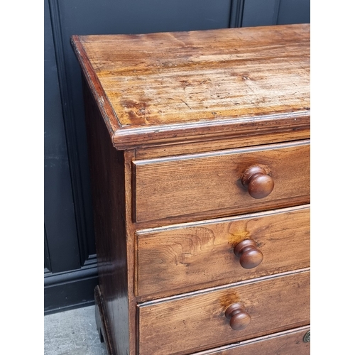1036 - A George III elm and pine chest of drawers, 95.5cm wide.