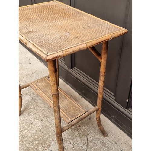 1039 - An antique bamboo and rattan occasional table, 60cm wide.