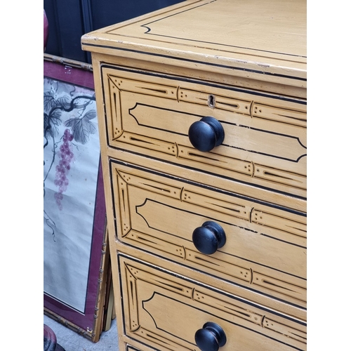 1043 - A 19th century pine chest of drawers, painted with simulated bamboo decoration, 103.5cm wide.... 