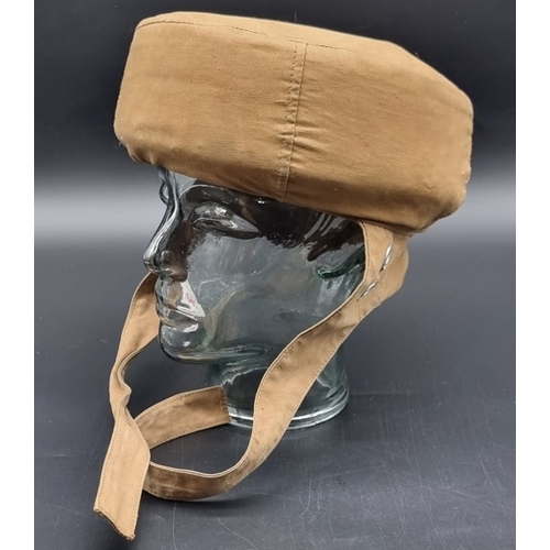 104 - A British 'Bungee' parachute training helmet, no visible maker's marks.