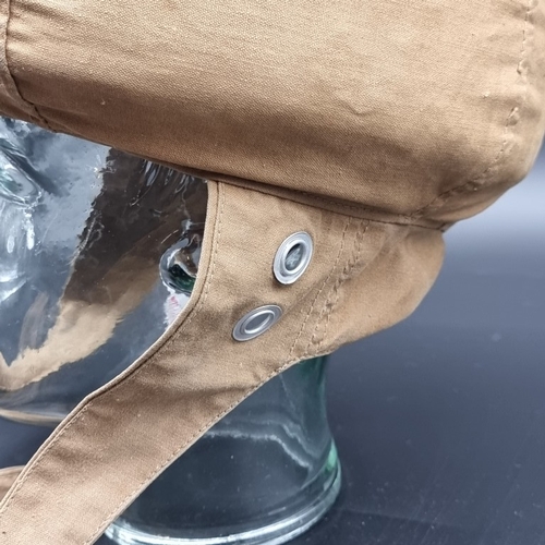 104 - A British 'Bungee' parachute training helmet, no visible maker's marks.