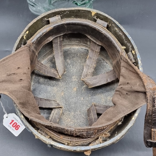 106 - A WWII British first model army despatch rider's helmet.