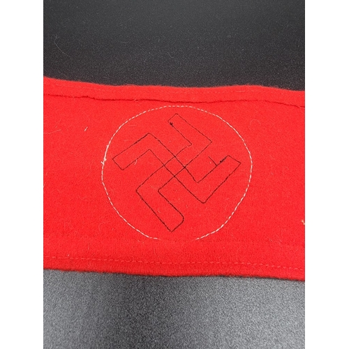 A German Third Reich NSDAP armband, 36cm; together with a pair of SS ...