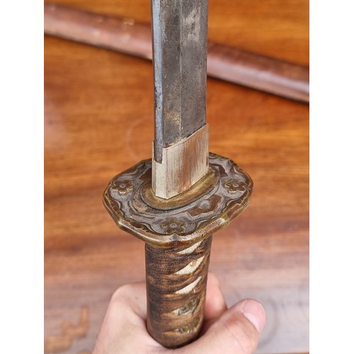 20 - A Japanese wakizashi and scabbard, with WWII mounts, 53cm blade, overall length 82cm.... 
