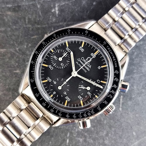 A circa 1999 Omega 'Speedmaster' chronograph stainless steel automatic wristwatch, 39mm, Ref. ST175-0032, Cal. 1140, on Omega 'Speedmaster' bracelet, boxed with manual. (Repaired in 2019)