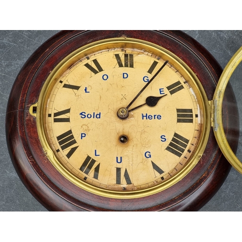 41 - A small early 20th century Continental wall clock, the 8in dial inscribed 'Lodge Plugs Sold Here', w... 