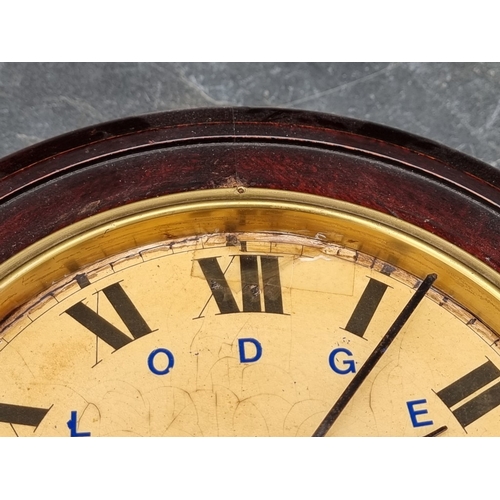 41 - A small early 20th century Continental wall clock, the 8in dial inscribed 'Lodge Plugs Sold Here', w... 