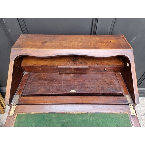 1044 - An 19th century Continental walnut and marquetry bureau de dame, 65.5cm wide.