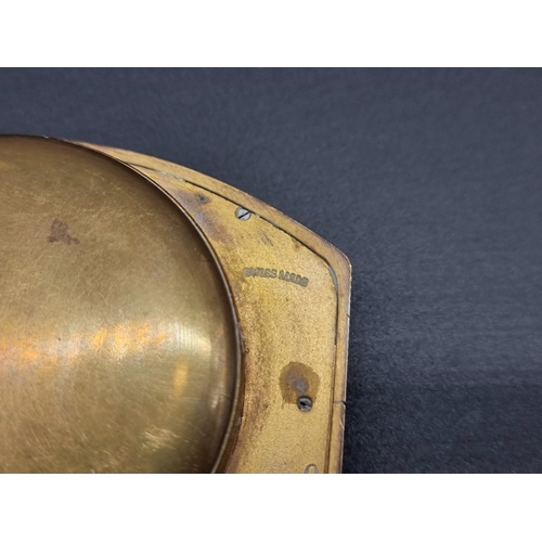 11 - A 1930s brass dashboard timepeice, 8.5cm wide.