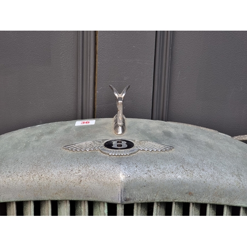 36 - A Bentley Mk.VI radiator grille, (dented).