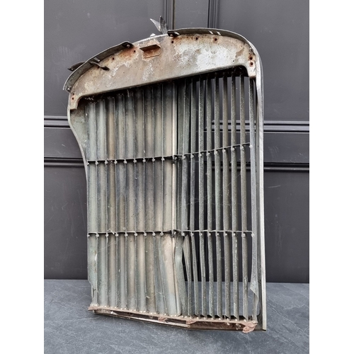 36 - A Bentley Mk.VI radiator grille, (dented).