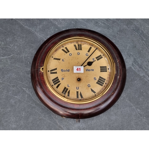 41 - A small early 20th century Continental wall clock, the 8in dial inscribed 'Lodge Plugs Sold Here', w... 