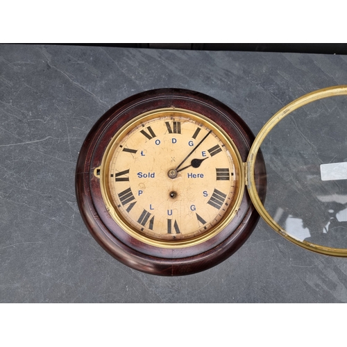 41 - A small early 20th century Continental wall clock, the 8in dial inscribed 'Lodge Plugs Sold Here', w... 