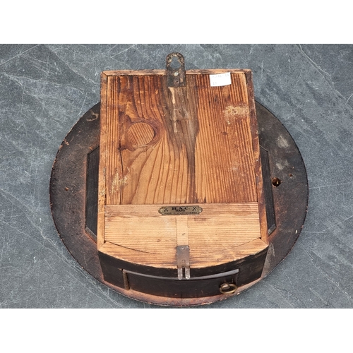 41 - A small early 20th century Continental wall clock, the 8in dial inscribed 'Lodge Plugs Sold Here', w... 