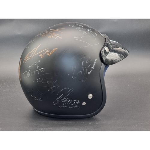 43 - A Sparco presentation autographed open face helmet, to include the signatures of: Emanuele Pirro; Ma... 