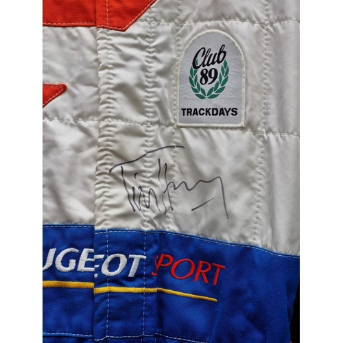 44 - A Sparco 'Tim Harvey' race suit, signed.