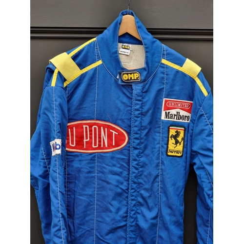 45 - An OMP Nomex III race suit.