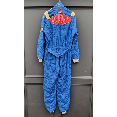 45 - An OMP Nomex III race suit.