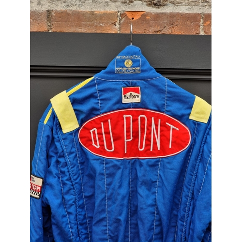 45 - An OMP Nomex III race suit.