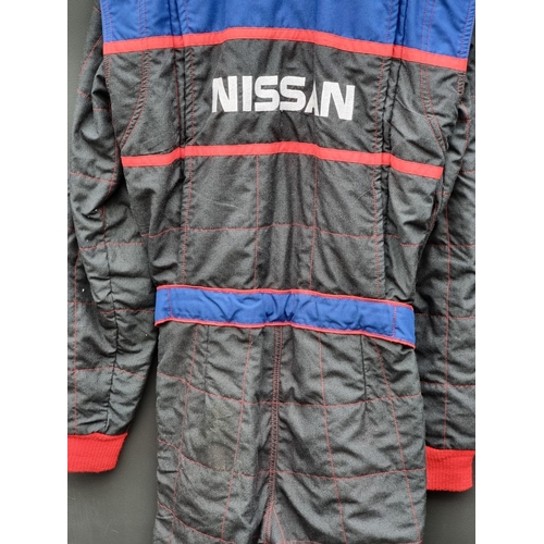 46 - An AWS Nomex III 'Tiff Needell' race suit.
