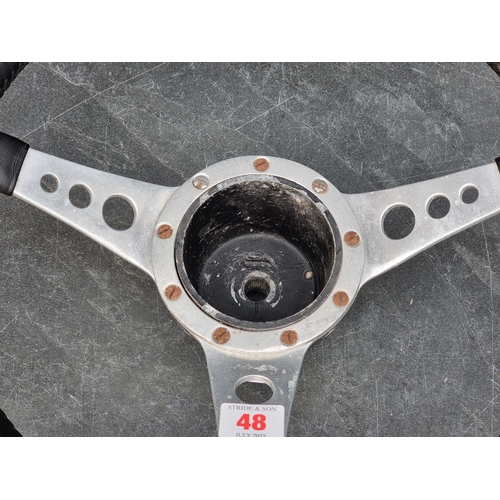 48 - A Moto-Lita 14.5in dished steering wheel, from a 1963 Mini Cooper.