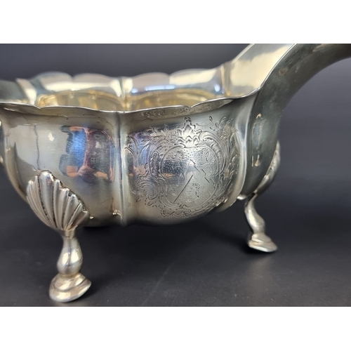 211 - A pair of George II silver sauce boats, by&nbsp;John Pollock, London 1752, height to handle 13cm, 74... 