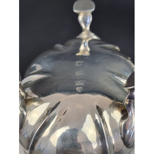 211 - A pair of George II silver sauce boats, by&nbsp;John Pollock, London 1752, height to handle 13cm, 74... 