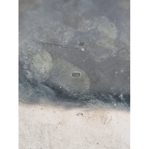 220 - A large Chinese export white metal salver, by Wang Hing, stamped 'WH90', 37cm diameter.... 
