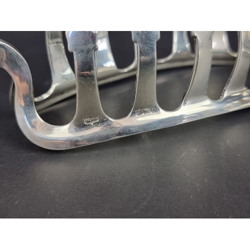 233 - A pair of silver toast racks, by&nbsp;Mappin & Webb Ltd, Birmingham 1938, 15cm wide, 209g.... 