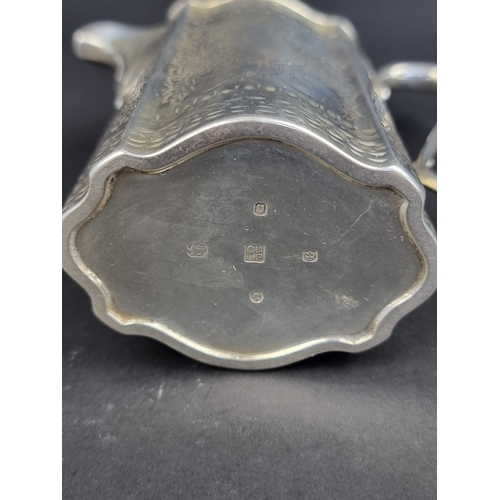 235 - A Victorian silver milk jug, by&nbsp;Roberts & Belk, Sheffield 1887, height to handle 11cm, 163g... 