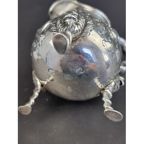 236 - A George III Irish silver cream jug, maker's mark indistinct, Dublin 1798, height to handle 10.5cm, ... 