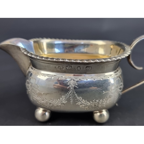 237 - A Victorian silver cream jug, by&nbsp;Hilliard & Thomason, Birmingham 1894, height to handle 6cm... 