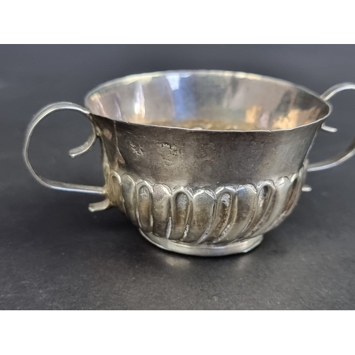 238 - A rare miniature 17th century silver porringer, marks rubbed, London, incised to base 'R T M', 8cm w... 