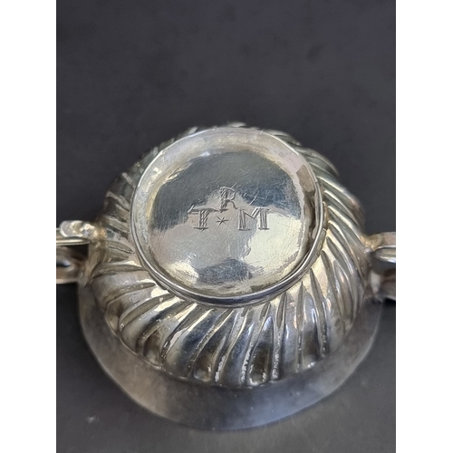 238 - A rare miniature 17th century silver porringer, marks rubbed, London, incised to base 'R T M', 8cm w... 