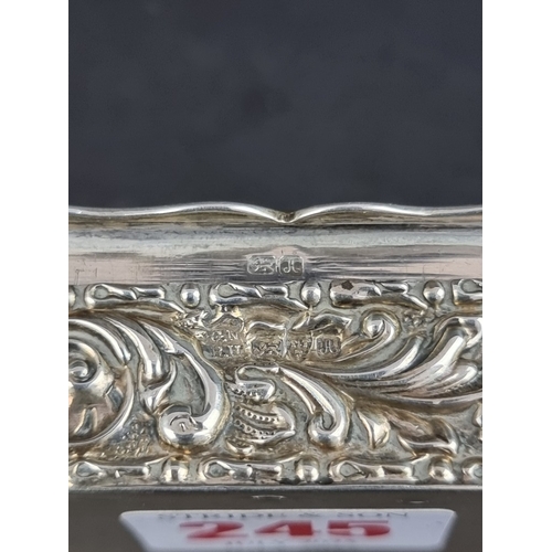 245 - A Victorian repousse silver snuff box, by George Nathan & Ridley Hayes, Chester 1901, 8.8cm wide... 