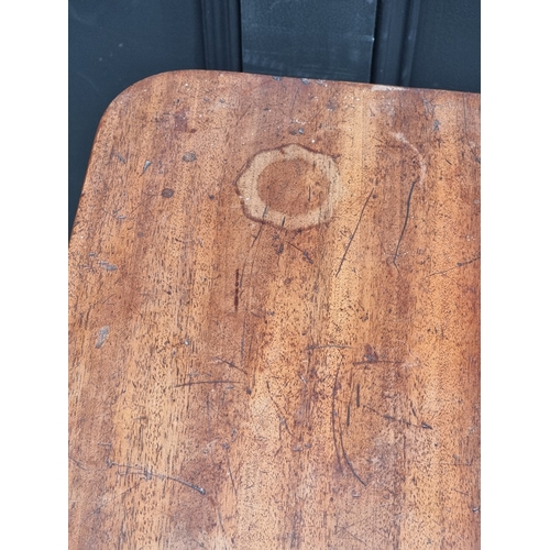 1002 - A George III mahogany tripod table, with fixed top, 56.5cm wide.