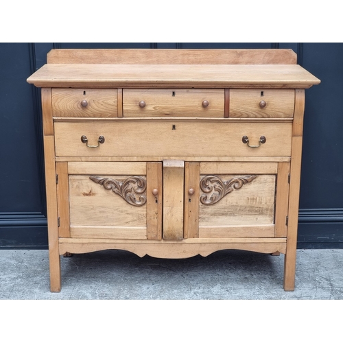1012 - A Canadian satin walnut side cabinet, 122cm wide.