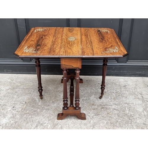 1025 - A late 19th century rosewood and ivorine inlaid Sutherland table, 76cm wide.