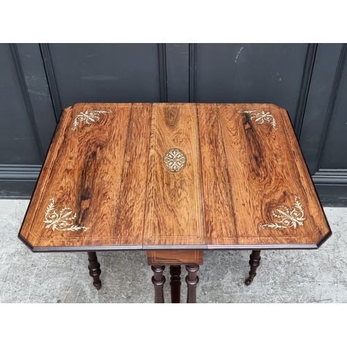 1025 - A late 19th century rosewood and ivorine inlaid Sutherland table, 76cm wide.