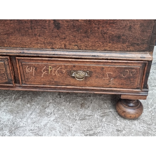 1030 - An oak mule chest, 94cm wide.