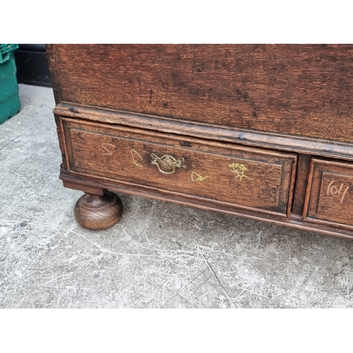 1030 - An oak mule chest, 94cm wide.