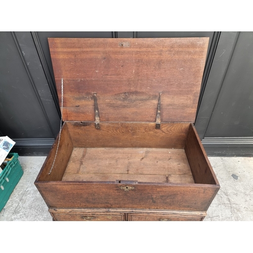 1030 - An oak mule chest, 94cm wide.