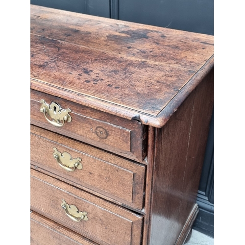 1031 - An 18th century oak chest of drawers, 101cm wide.