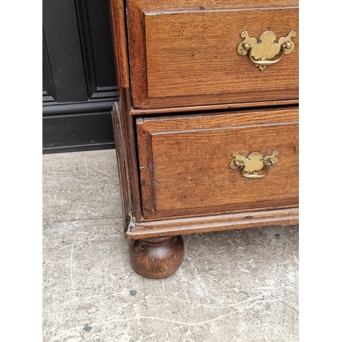 1031 - An 18th century oak chest of drawers, 101cm wide.