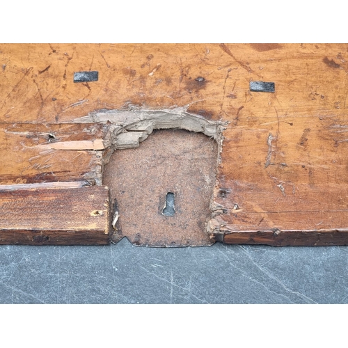 1034 - A small 17th century and later carved cedar and pine coffer, 77.5cm wide, (extensive alterations).... 