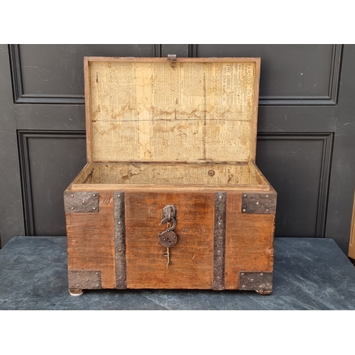 1036 - An antique teak and steel bound chest, 36cm high x 59cm wide x 36cm deep.