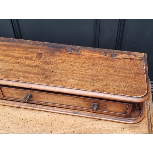 1038 - A Victorian mahogany side table, stamped 'Wilkinson', 122cm wide.