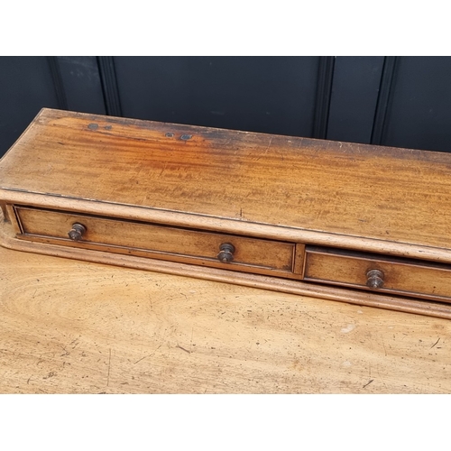 1038 - A Victorian mahogany side table, stamped 'Wilkinson', 122cm wide.