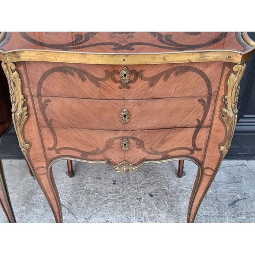 1050 - A good pair of early 20th century, Louis XV style, tulipwood, marquetry and gilt metal mounted gueri... 